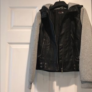 Gray jacket with black leather sleeves